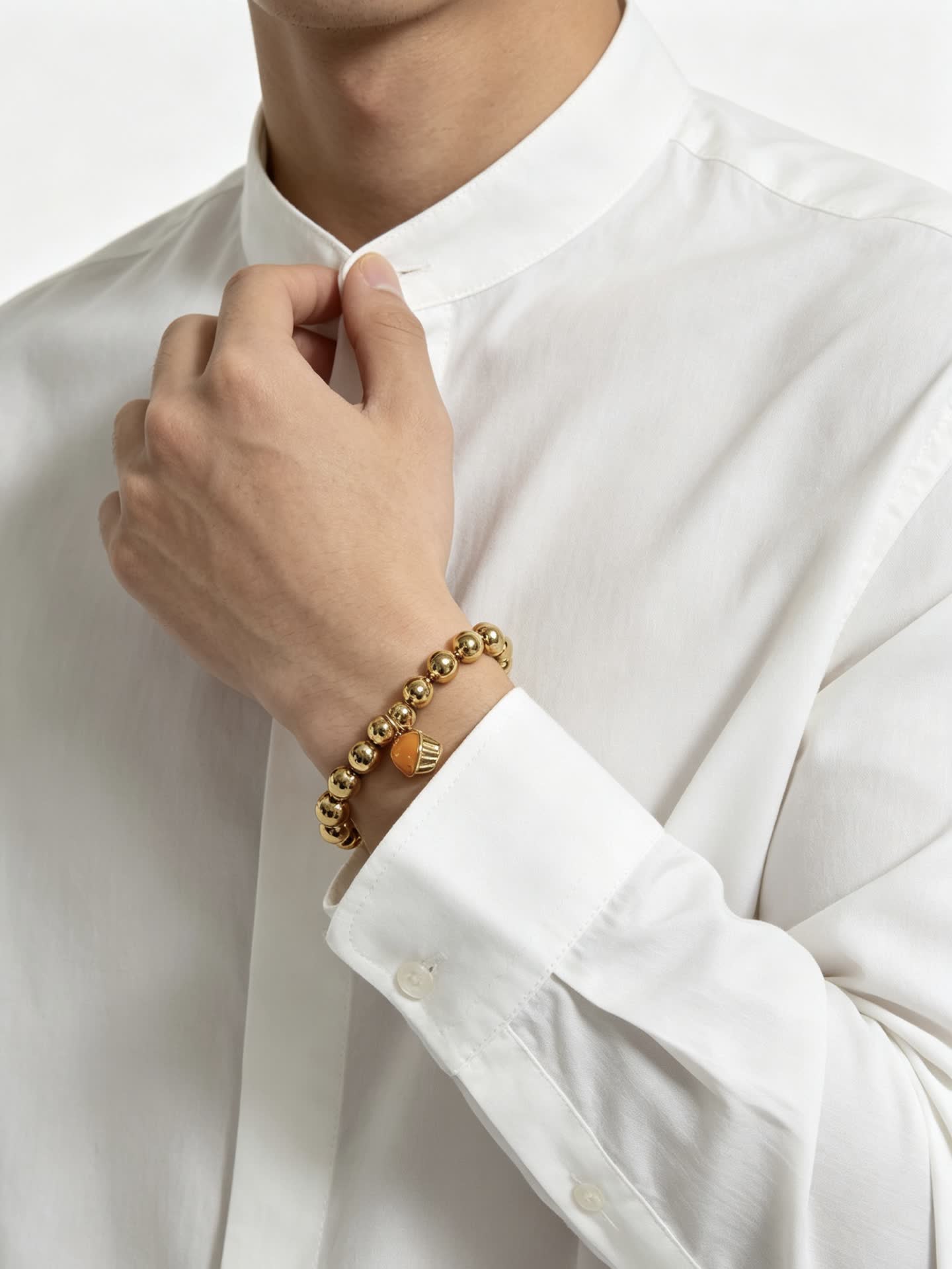 Tiffany & Co. Gold Bead Bracelet with Cupcake Charm